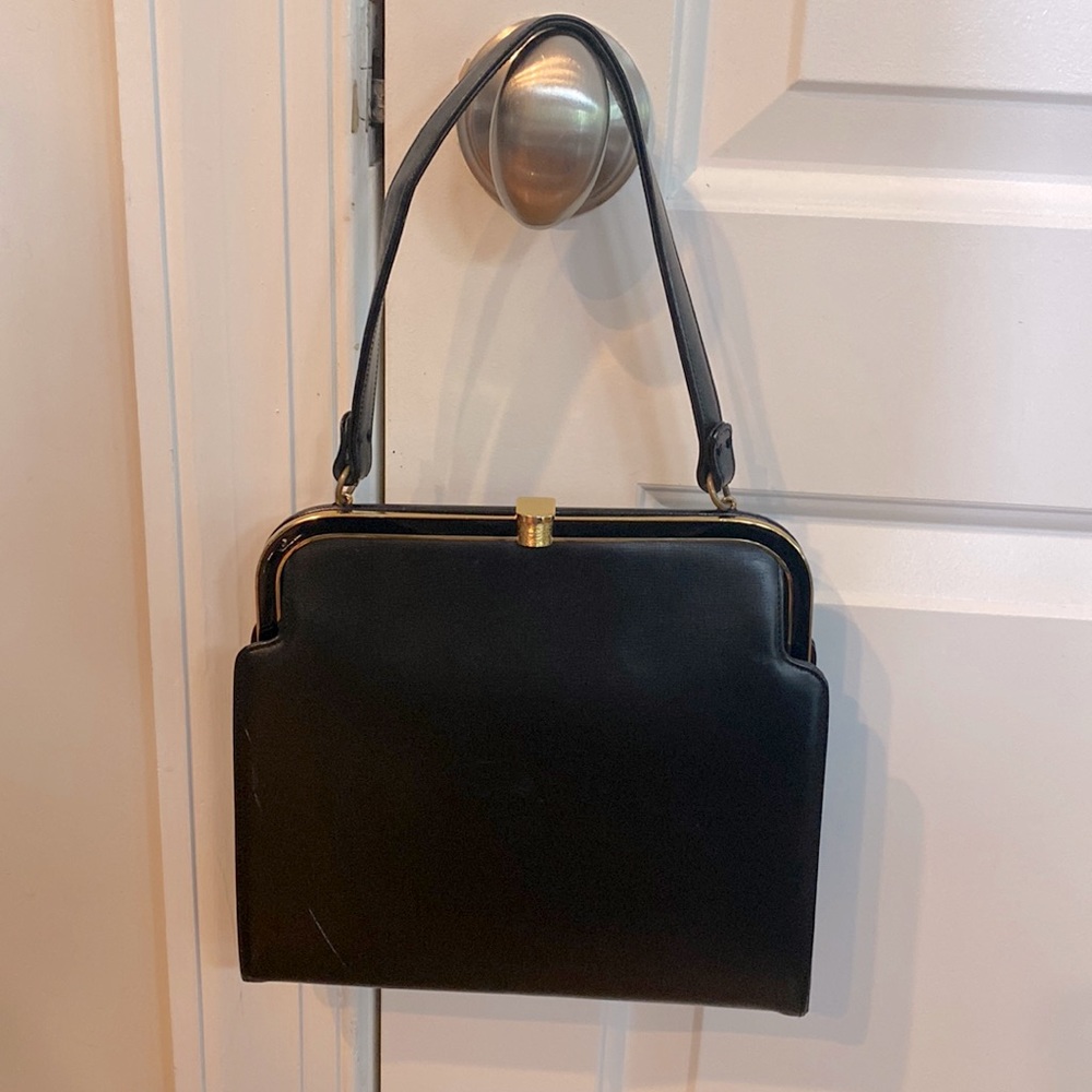 Coblentz original purse.  Black leather with gold trim.